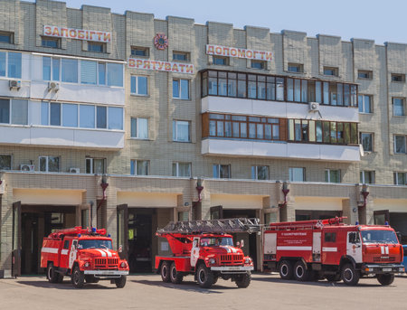 KIEV, UKRAINE - 8MAY, 2014: Three fire engines to the fire station in Kiev, Ukraine.のeditorial素材