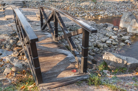 Stylized Japanese wooden bridge in autumn