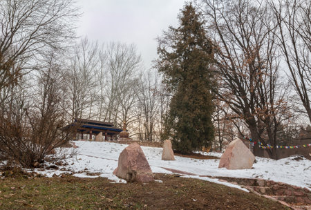 KIEV, UKRAINE- DEC 21, 2016:In Kyiv Botanical Garden named Grishko, thematic section "Tibetan garden" with the Buddhist meditation gazebo for winter, Kiev, Ukraine.のeditorial素材