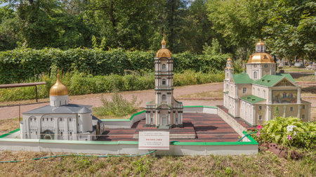 KIEV, UKRAINE - JULY 3, 2016: Entertaiment Park Ukraine in Miniature (Small scale Ukraine). Models of the temples of the Holy Dormition Pochayiv Lavra in Kiev, Ukraineのeditorial素材