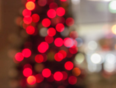Bokeh from the lights from the Christmas tree out of focusの写真素材