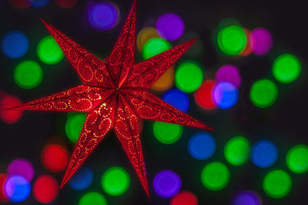 Illuminated handcrafted Christmas decoration stars. Background for Christmas, New Year banner, postcard, calendarの写真素材