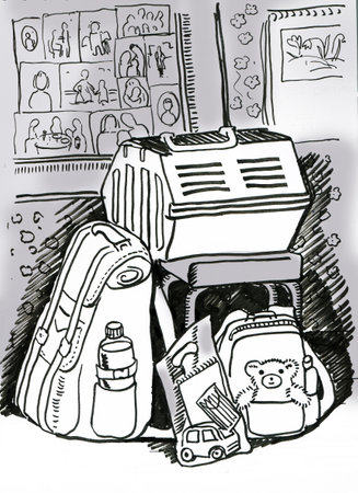 Two backpacks and a cat carrier against the background of family photos in a frame and a calendar. Concept of evacuation from home.の写真素材