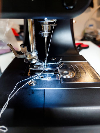 Close up of sewing machine with needle and thread. Sewing conceptの写真素材