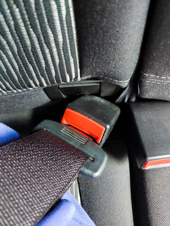 Car seat belt in a modern car, closeup of photo.