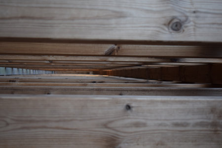 Wooden boards in a construction site, close-up, selective focusの写真素材