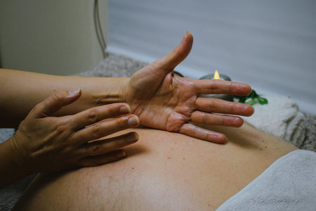 man having a massage in a spa salon. Body care concept.の写真素材