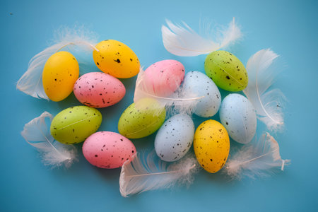 Easter eggs and feathers on a blue background. Toned.