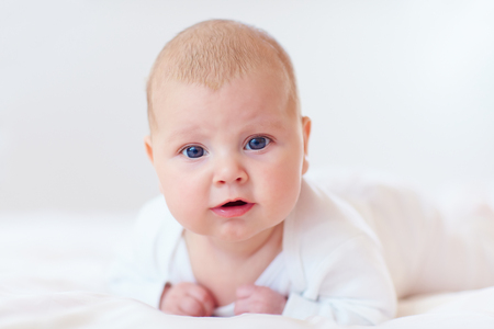 portrait of cute infant baby, two months oldの写真素材