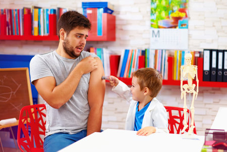 family playing in doctor and patient, father scared of injection