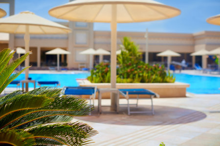 Hurghada, Egypt - August 2020: a view on all inclusive tropical resort and swimming pool with lounge zoneのeditorial素材