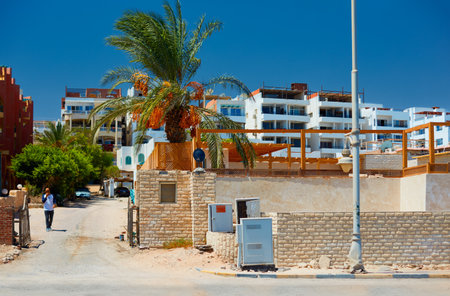 Sheraton Road, Hurghada, Egypt - August, 2020: a cozy bystreet along the Sheraton Road in Hurghada, Egyptのeditorial素材