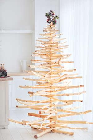 eco friendly, reusable christmas tree made from wood residues, that was left after sanitary cleaning of forest beltの写真素材