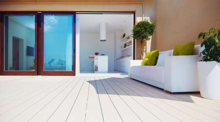 modern patio with open space kitchen, sliding doors at summer dayの写真素材