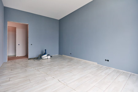 a new apartment repair finishing works in progress, plastering, painting and flooring constructionの写真素材