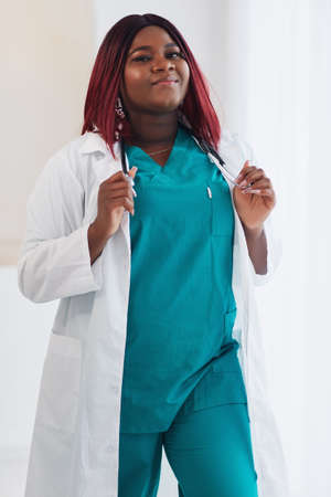portrait of confident young physician with stethoscopeの写真素材