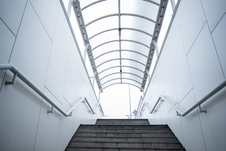 Pedestrian crossing in a tunnel, view of the steps from below when exiting, exiting the tunnel