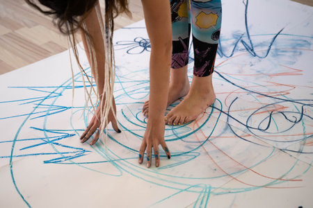 Kharkow, Ukraine 10.11.21:A body painting practitioner creates abstract works of art using their...