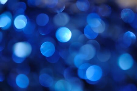 Blue and silvery brilliant vintage lights background. de-focusedの写真素材