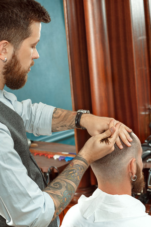 Hair styling by a professional barberの写真素材