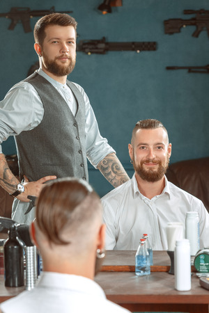 Customer satisfied by a new haircutの写真素材