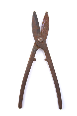 Old rusty garden pruner.
Studio photography on a white background.の写真素材