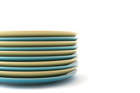 Pile salad plates.Studio photography on a white background.