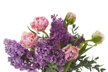 Bouquet of flowers made up of tulips and lilacs.Studio shot on pure white background.の写真素材