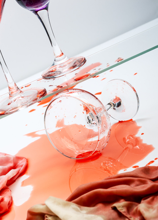 Fallen glass with a cocktail.の写真素材