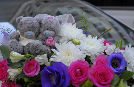 Teddy bear with flowers decoration for weddingの写真素材
