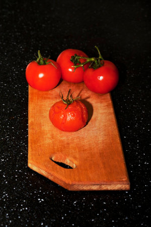roasted tomato with fresh on the plateの写真素材