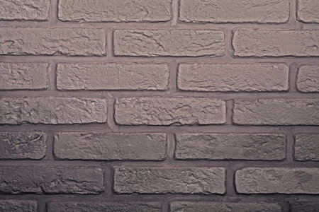 Abstract weathered texture stained old stucco light gray and aged paint white brick wall backgroundの写真素材
