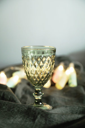 Green glasses on the table with a green cotton tableclothの写真素材