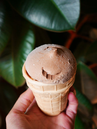 Delicious chocolate ice cream cone delightの写真素材