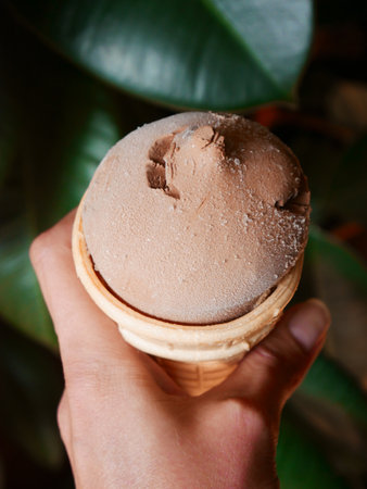 Delicious chocolate ice cream cone delightの写真素材