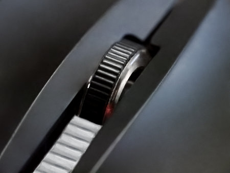 Close-Up View of a Computer Mouse Scroll Wheelの写真素材