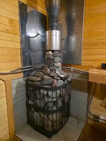 Classic Sauna Heater Design with Natural Stonesの写真素材
