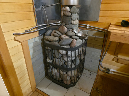 Classic Sauna Heater Design with Natural Stonesの写真素材