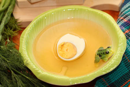 beef broth with egg in rural styleの写真素材