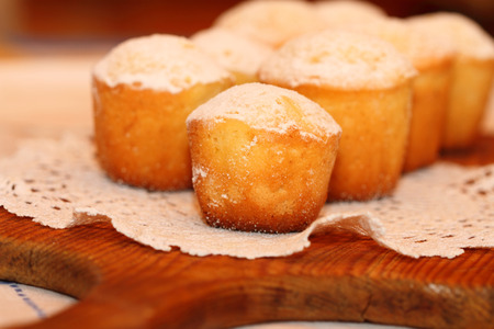 the lemon cakes served on a lacy napkinの写真素材