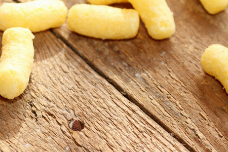 background: corn sticks on an old boardの写真素材