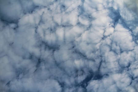 Bue bright sky with clouds, natural beautiful backgroundの写真素材