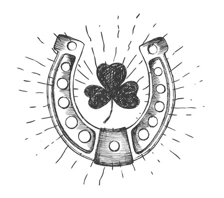 Horseshoe with clover leaf. St. Patrick's Day symbol. Hand drawn vector illustration in sketch style.のイラスト素材
