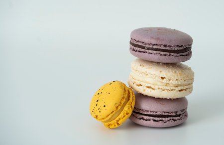 Colorful macaroons on white background. Macaroon is a French sweetmeat.の写真素材