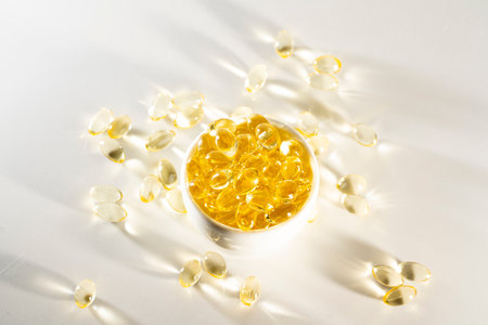 Food supplement oil filled fish oil, omega 3, omega 6, omega 9, vitamin A, vitamin D, vitamin E, flaxseed oil.の写真素材