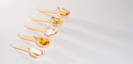 Spoons with vitamins, Vitamin D, omega 3, omega 6, Food supplement oil filled fish oil, vitamin A,...