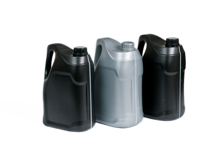Plastic canisters for machine oil isolated on white background.の写真素材