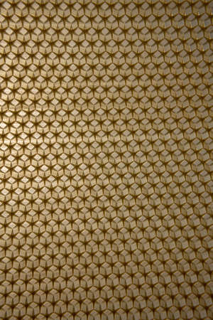 Abstract hexagon structure is honeycomb from bee hive filled with golden honey. Honeycomb summer composition consisting of gooey honey from bee village. Honey rural of bees honeycombs to countryside.の写真素材
