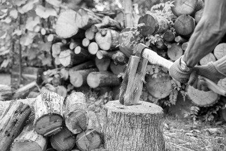 Photography on theme big steel ax with wooden handle, metal ax for hunting, photo ax consisting of...