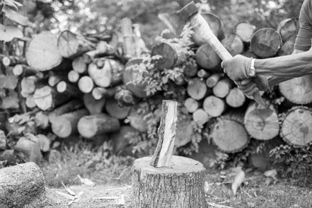 Photography on theme big steel ax with wooden handle, metal ax for hunting, photo ax consisting of...